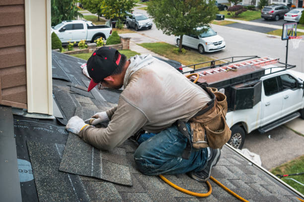 Professional Storm Damage Roof Repair technician working in Deer Park, NY